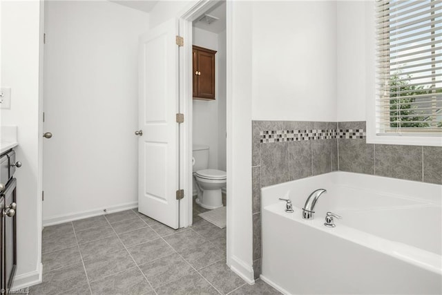 301 Summerwalk Rd, Greensboro, NC 27455 - bathroom with a bath, vanity, and tile patterned flooring