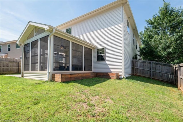 301 Summerwalk Rd, Greensboro, NC 27455 - rear view of house featuring a sunroom, a fenced backyard, and ceiling fan