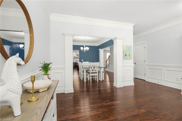 301 Summerwalk Rd, Greensboro, NC 27455 - interior space featuring hardwood / wood-style flooring, crown molding, wainscoting, a decorative wall, and a chandelier