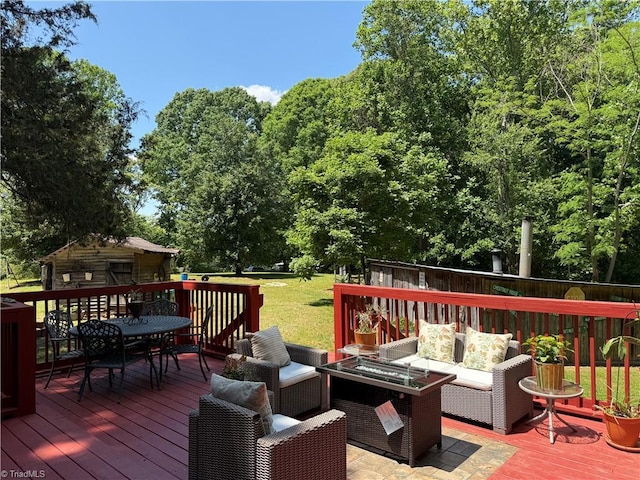 deck with an outdoor hangout area and outdoor dining space