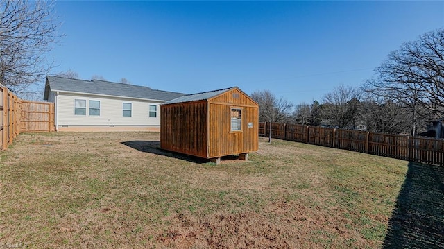 exterior space with a shed and a lawn