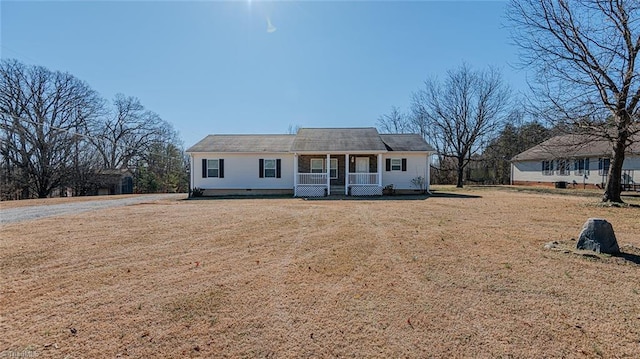 single story home featuring a front yard and covered porch