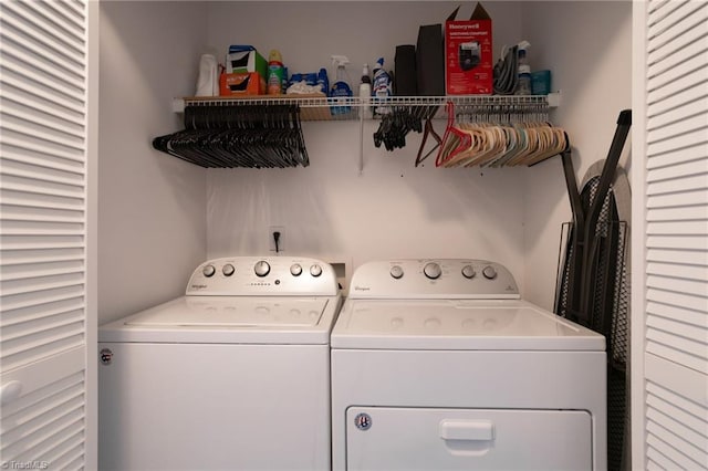 laundry room featuring separate washer and dryer