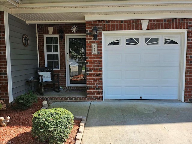 entrance to property featuring a garage