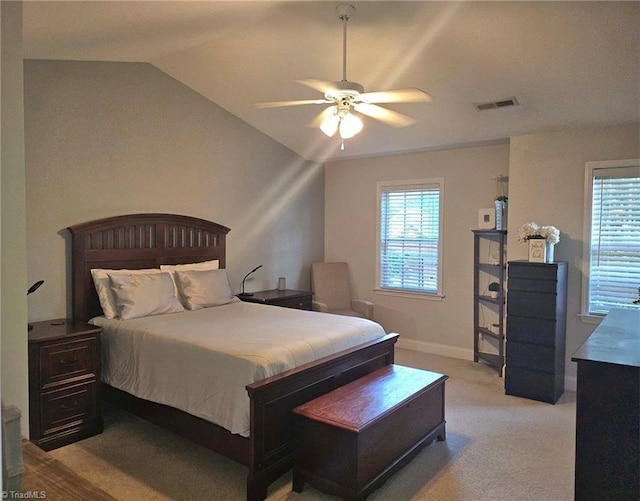 carpeted bedroom featuring ceiling fan and lofted ceiling