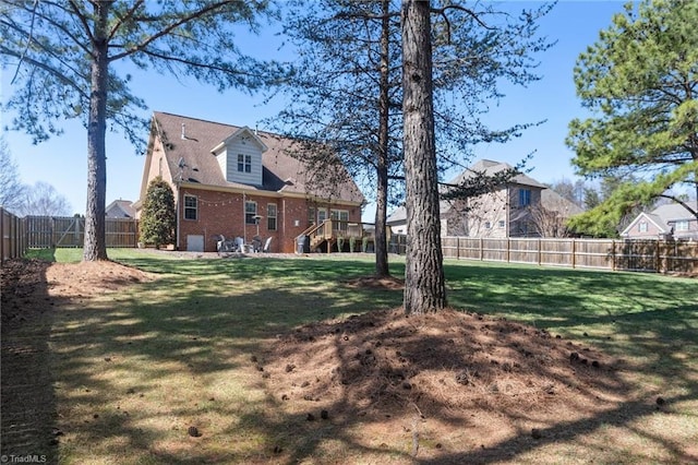 view of yard featuring a fenced backyard