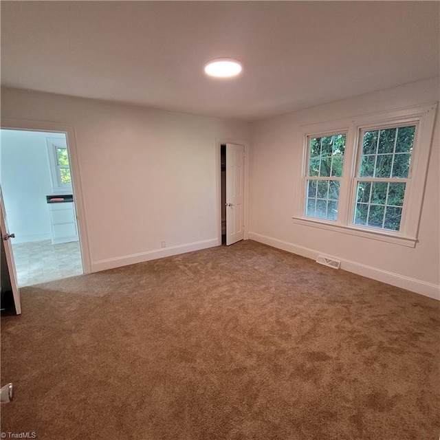 view of carpeted spare room