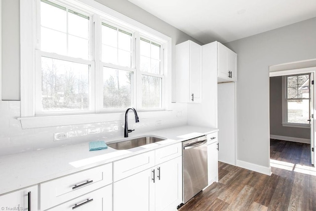 112 Emerald Ct, Trinity, NC 27370 - kitchen with dishwasher, a sink, light countertops, and healthy amount of natural light