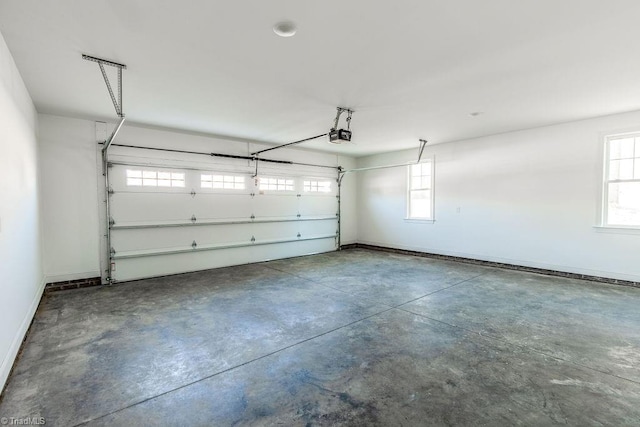 112 Emerald Ct, Trinity, NC 27370 - garage featuring baseboards and a garage door opener