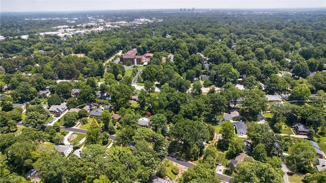 506 Audubon Dr, Greensboro, NC 27410 - drone / aerial view of a heavily wooded area