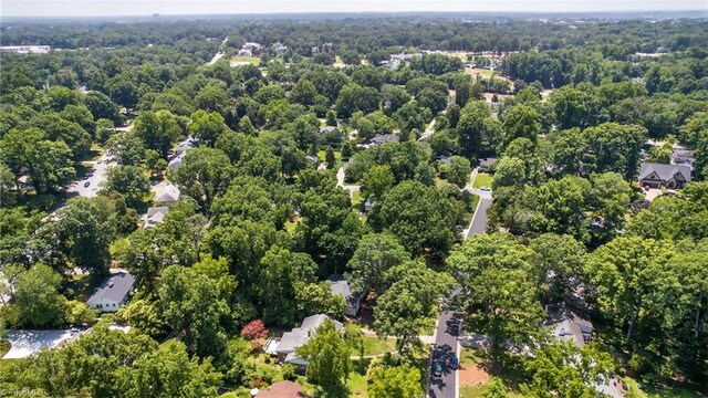 506 Audubon Dr, Greensboro, NC 27410 - aerial view of property and surrounding area featuring a forest