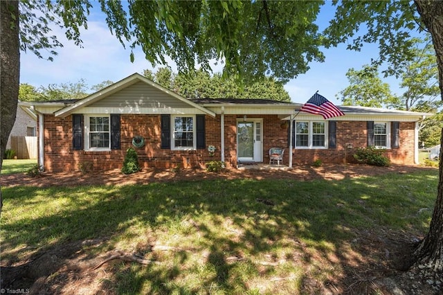 202 Stokes Forest Dr, King, NC 27021 - ranch-style home featuring a front lawn and brick siding