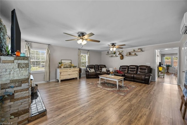 202 Stokes Forest Dr, King, NC 27021 - living area with ceiling fan, light wood-type flooring, plenty of natural light, and crown molding