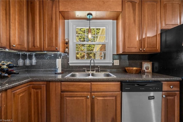 202 Stokes Forest Dr, King, NC 27021 - kitchen with stainless steel dishwasher, a sink, and brown cabinets
