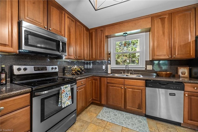 202 Stokes Forest Dr, King, NC 27021 - kitchen featuring stainless steel appliances, a sink, and backsplash