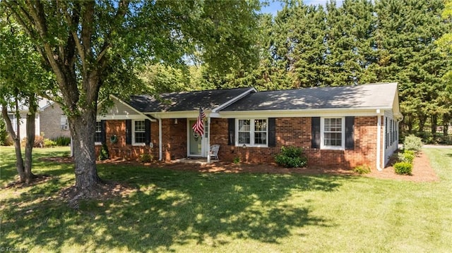 202 Stokes Forest Dr, King, NC 27021 - ranch-style home featuring a front lawn and brick siding