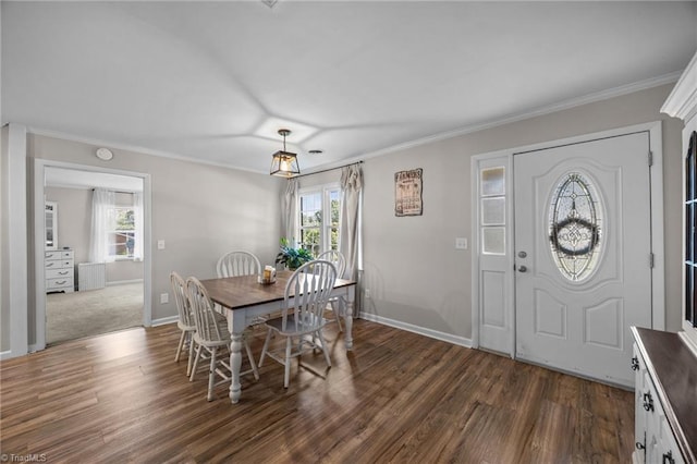 202 Stokes Forest Dr, King, NC 27021 - dining room featuring dark wood-type flooring, ornamental molding, and baseboards