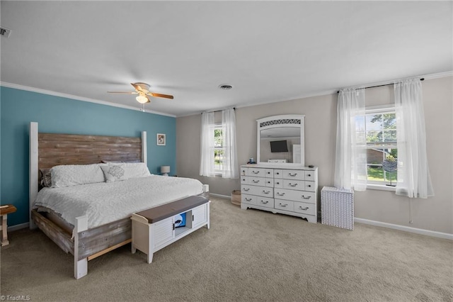 202 Stokes Forest Dr, King, NC 27021 - carpeted bedroom featuring multiple windows, ornamental molding, a ceiling fan, and baseboards