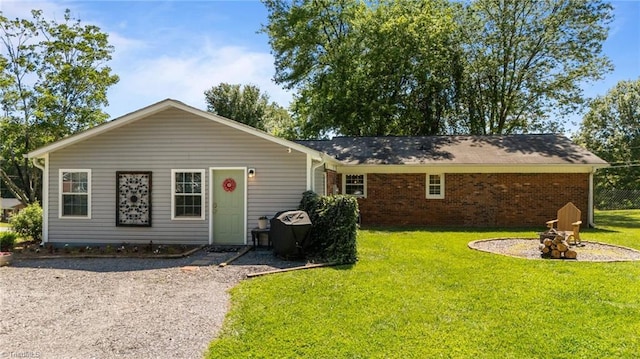 202 Stokes Forest Dr, King, NC 27021 - back of house featuring a yard and brick siding