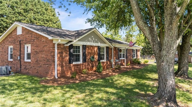 202 Stokes Forest Dr, King, NC 27021 - single story home with brick siding, a front lawn, and cooling unit