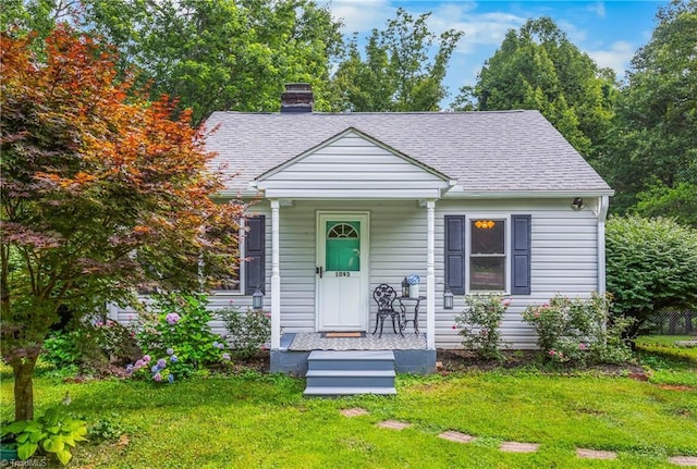 1093 Gordon Rd, Pinnacle, NC 27043 - bungalow-style house with a chimney, a front lawn, and roof with shingles
