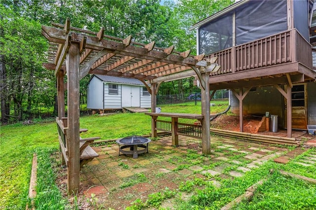 1093 Gordon Rd, Pinnacle, NC 27043 - view of yard with a fire pit, a storage unit, a pergola, and a deck