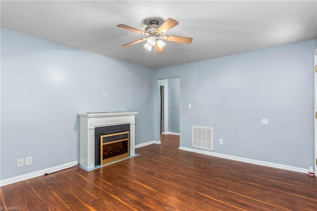 1093 Gordon Rd, Pinnacle, NC 27043 - unfurnished living room with ceiling fan, wood finished floors, and a fireplace with flush hearth