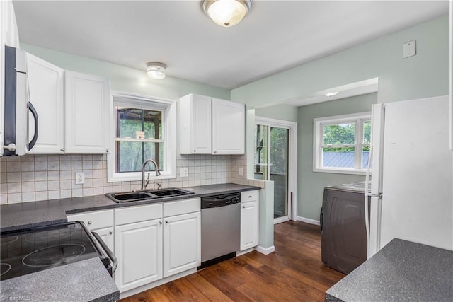 1093 Gordon Rd, Pinnacle, NC 27043 - kitchen featuring stainless steel appliances, white cabinets, tasteful backsplash, and dark wood-type flooring