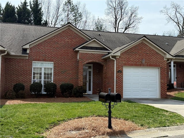 view of front facade featuring brick siding, an attached garage, driveway, and roof with shingles