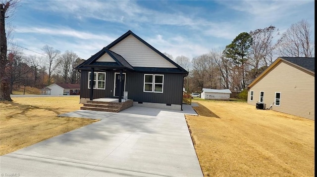 503 W End Blvd, Madison, NC 27025 - view of front of property featuring crawl space, driveway, cooling unit, and a front yard