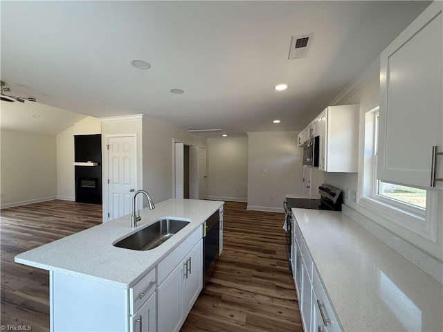 503 W End Blvd, Madison, NC 27025 - kitchen with a sink, open floor plan, appliances with stainless steel finishes, baseboards, and recessed lighting