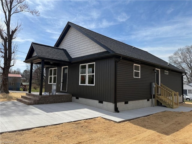 503 W End Blvd, Madison, NC 27025 - rear view of house with crawl space, a shingled roof, and a patio