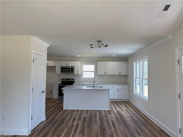 503 W End Blvd, Madison, NC 27025 - kitchen featuring stainless steel appliances, a sink, white cabinetry, ornamental molding, and plenty of natural light