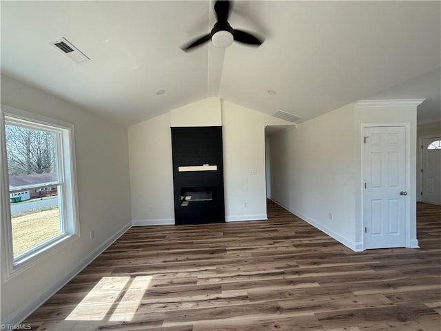 503 W End Blvd, Madison, NC 27025 - unfurnished living room with lofted ceiling, a ceiling fan, wood finished floors, baseboards, and a glass covered fireplace