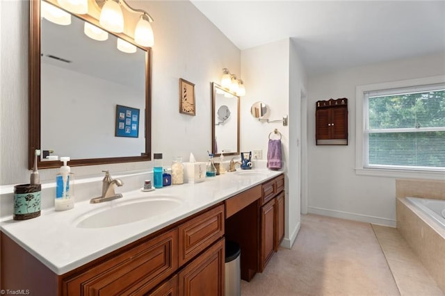 full bath with a sink, a relaxing tiled tub, visible vents, and double vanity