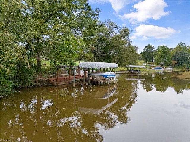 dock area featuring a water view and boat lift