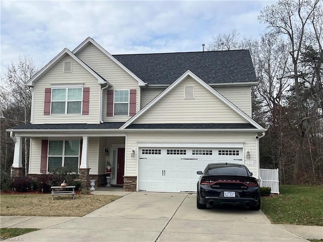 craftsman-style home with a garage