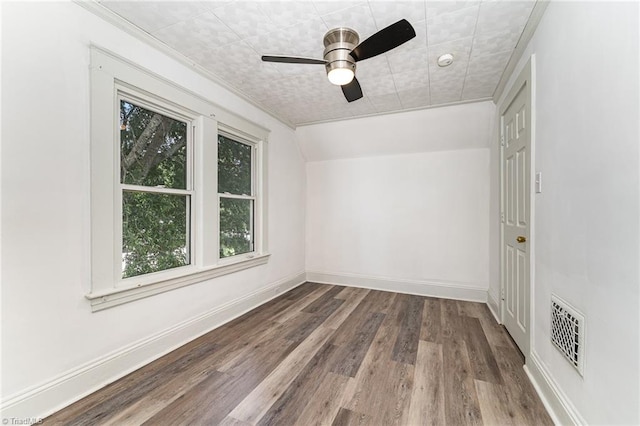 spare room featuring ceiling fan, crown molding, and hardwood / wood-style flooring