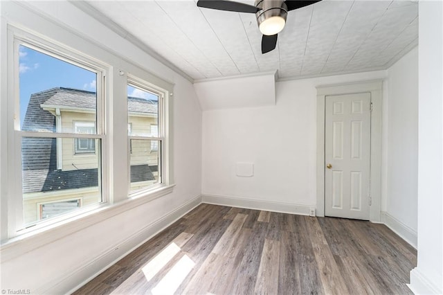 spare room with ceiling fan and hardwood / wood-style flooring