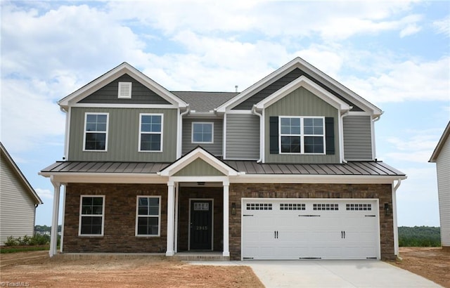 craftsman house featuring a garage