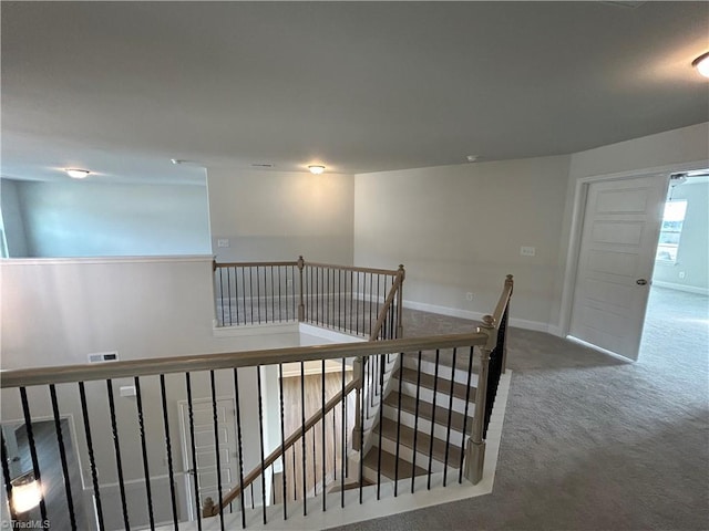 corridor featuring carpet floors