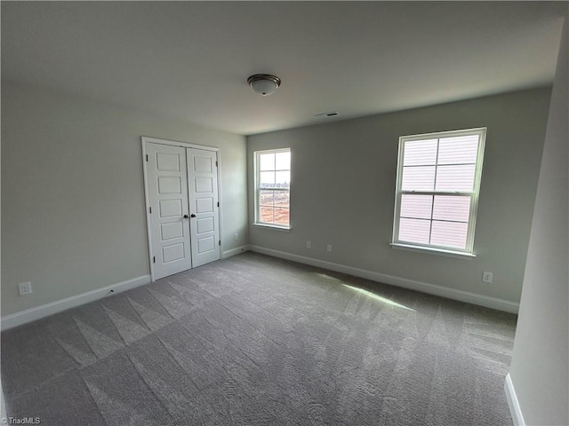 view of carpeted spare room