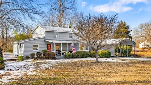 front facade with a carport and a porch