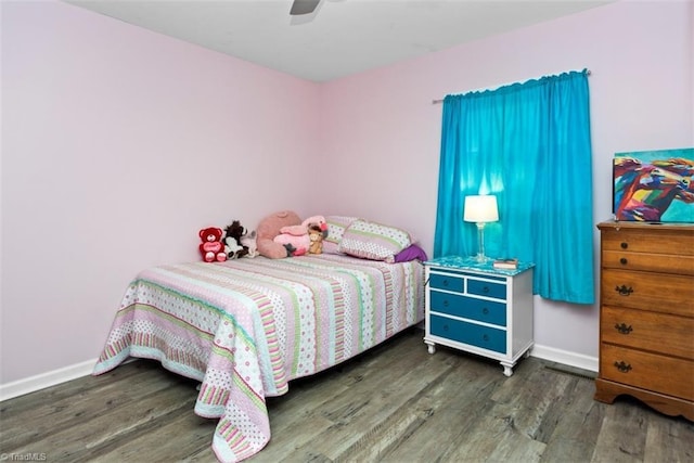 151 N Shore Dr, Lexington, NC 27292 - bedroom with baseboards, ceiling fan, and wood finished floors