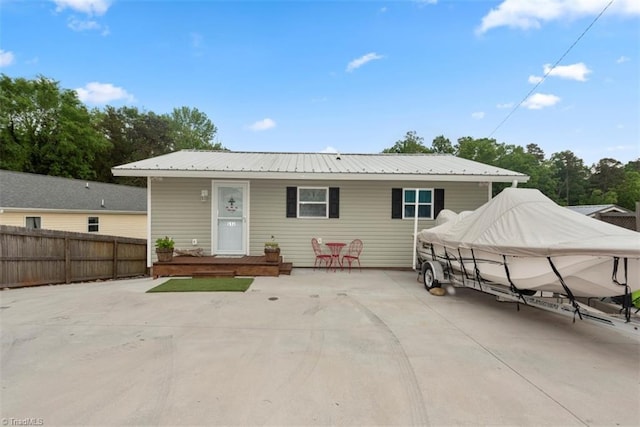 151 N Shore Dr, Lexington, NC 27292 - rear view of property with fence and metal roof