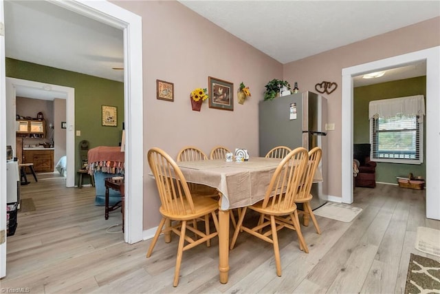 dining area featuring light hardwood / wood-style floors