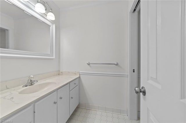 bathroom featuring vanity and crown molding