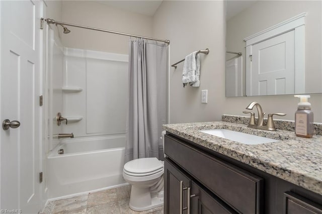 bathroom featuring vanity, shower / tub combo, and toilet