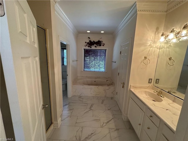 full bathroom with ornamental molding, vanity, toilet, and shower with separate bathtub