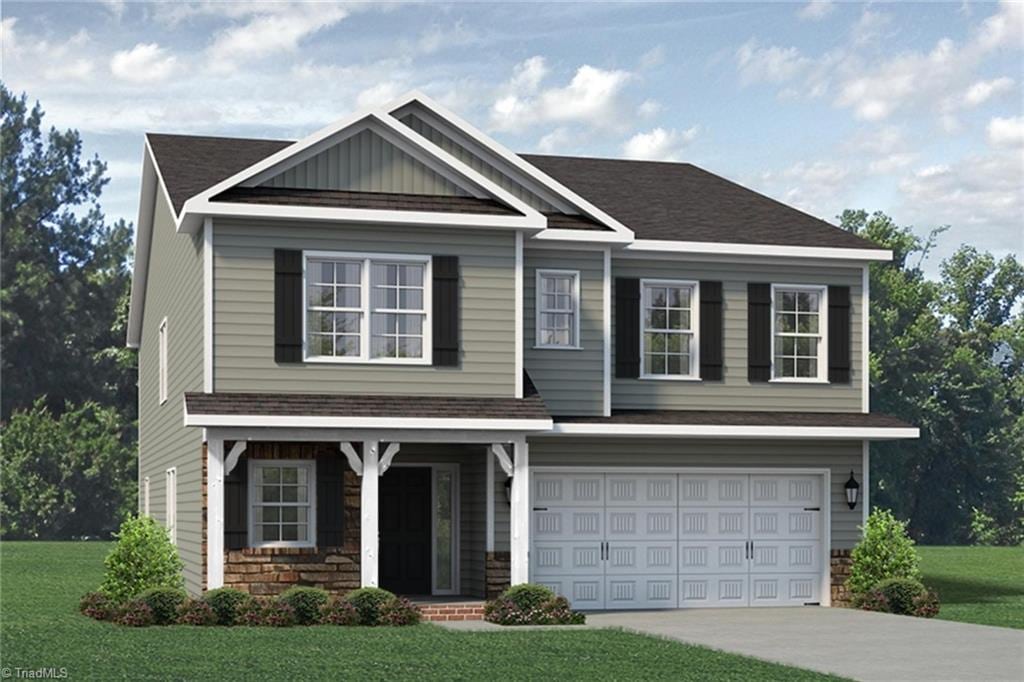 1938 Darrell Dr Lot # 11, Graham, NC 27253 - craftsman inspired home featuring a front yard, an attached garage, concrete driveway, and a shingled roof